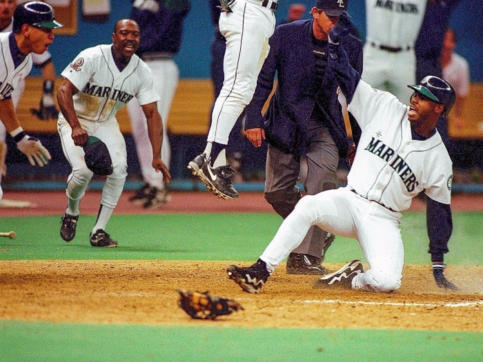Ken Griffey Jr. slides into home